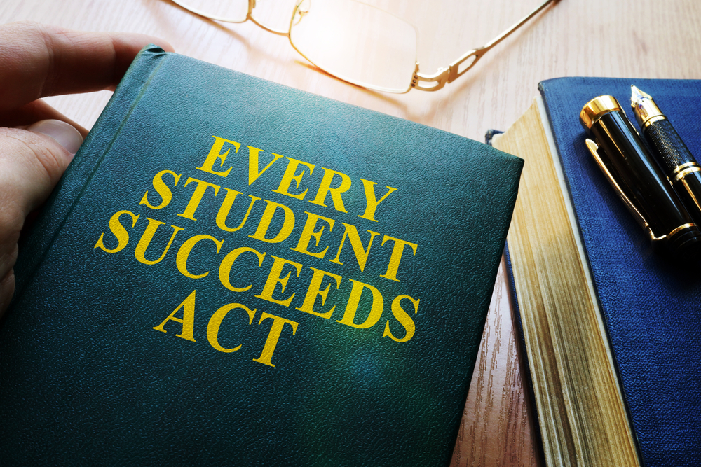 Every Student Succeeds Act ESSA on a desk.